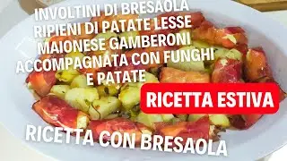 involtini di bresaola ripieni di patate lesse maionese gamberoni accompagnata con funghi e patate