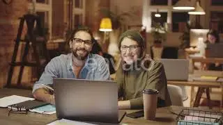 Two Cheerful Male and Female Colleagues Posing for Camera in Office | Stock Footage - Envato ele...