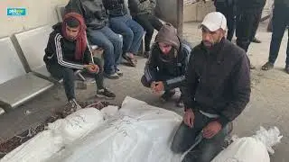 CONTENT WARNING: Families mourn loved ones outside Al Najjar hospital in Rafah, Gaza
