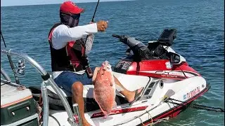 Jet ski fishing ..Red snappers!! Jumbo bull red . Nasty weather. Old oil rig.