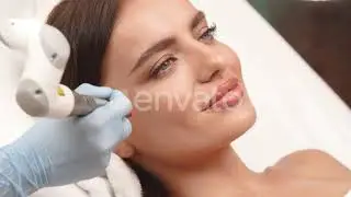 Happy Woman with Perfect Skin Having Erbium Laser Theraphy | Stock Footage - Envato elements