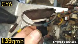 How does a scooter with a torn carburetor membrane work