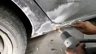 Рено Клио.Ремонт  оловом помятой арки.