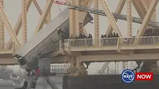 Daring rescue from 18-wheeler dangling off bridge over Ohio River in Louisville