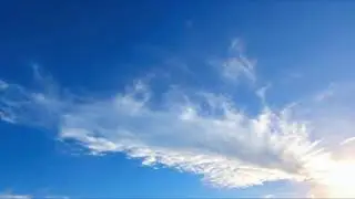 Time lapse of Beautiful blue sky in pure daylight with puffy fluffy white clouds background.
