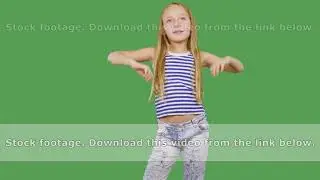 Young girl model posing front camera on green background. Girl teenager smiling and looking to