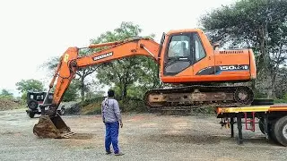 How to bring down the excavator from flat bed safely ? - Doosan