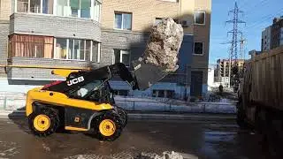 Loading of heavy snow and ice by JCB loader