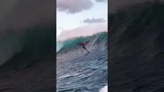 Wing foiling a crazy massive wave! 😱🤯