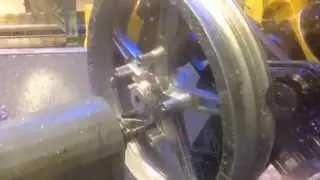 Robotic System for Deburring & Milling Motorcycle Wheels – Acme Manufacturing