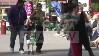 Madonna with kids visiting the Eiffel Tower in Paris