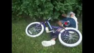 kid falls down on his or her bike