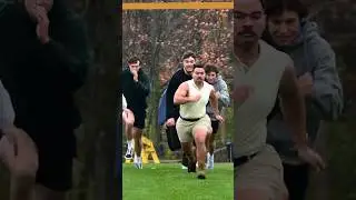 12 football players versus 1 guy.