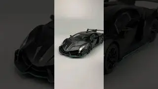 Miniature black Lamborghini Veneno 1/24 scale diecast model car 