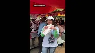 Rosângela Moro come pastel em SP, enquanto mulher remexe no lixo em busca de comida