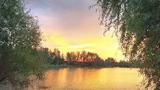 Sunset on the river in the village relax for 1 minute