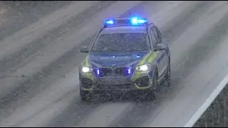 Police Car on snowy highway