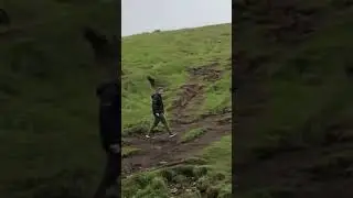 Throwing a rock off of a cliff in Iceland