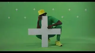 Copyright free Green screen man holding plus
