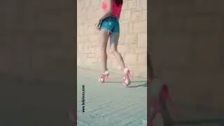 WALKING IN OPEN TOES HIGH HEELS AND DENIM SHORTS