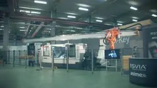 ABB Robotics - 5 axis robot on linear gantry - in action