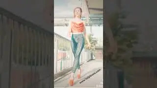 WALKING IN HIGH HEELS AND LEATHER LEGGINGS