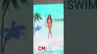 Model in pink bikini swimsuit swimwear