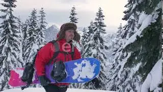 Male Snowboarder Red Jacket Hiking Up Mountain Trail | Stock Footage - Envato elements