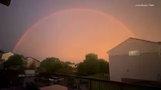 Rainbow and lightning appear together in Ramsey, Minnesota