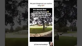 A man using a lawnmower to mow his front yard nearly gets hit by an out-of-control car #shorts #wow