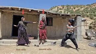 The husband's attempt to calm and prevent the second wife's brutal attack on the first wife.