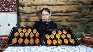Woman is cooking amazing pies by grandma's recipe in firewood oven
