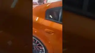 Orange Widebody Scatpak Charger on 26’s Rucci’s