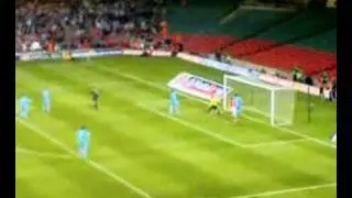 Wales score through Koumas penalty..