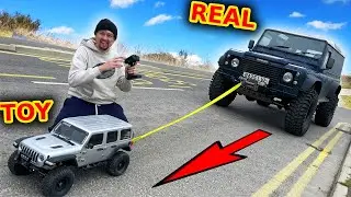 RC Jeep tries to tow a real Jeep