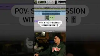 Audio Engineer In A Studio Session With A Rapper