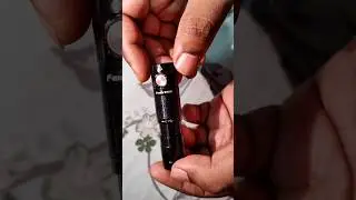 Fake Fenix E09R Torch sent by LightMen India 