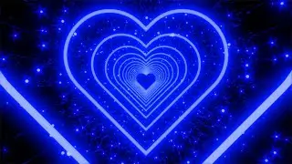 Blue Neon Heart With Star Shaped Glitter Particles on a Glittery Background. 4K Video Loop