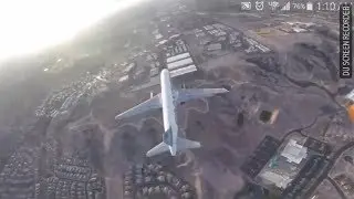 Drone has frightening apparent close call with jet