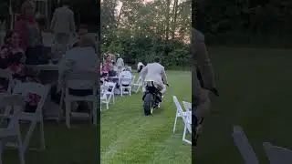 Bride and groom ride their motorcycles to the alter at their wedding for photos!