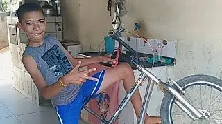 menor de 11 ano fazendo manobra na bike aro 20