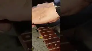 Rolling the edges of a fretboard on a budget.