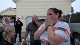 Parents of 12 break down sobbing when they discover what Secret Santa has brought them