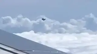 Classic Flying Saucer UFO Filmed Over Colombia During A Commercial Flight