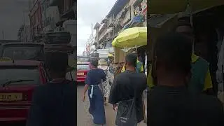 How is she balancing that box? Kumasi, Ghana