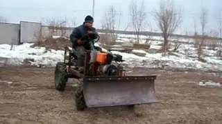 Самодельный отвал на минитрактор