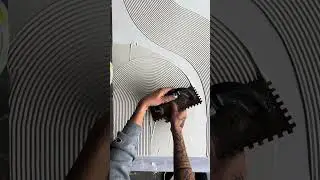 Artist is showing how to create and clean a textured art canvas!