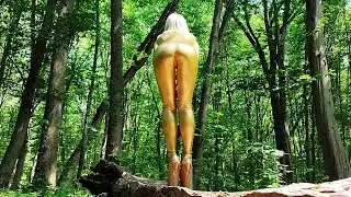 IN A GOLDEN JUMPSUIT IN THE FOREST WITH HIGH GOLDEN HEELS 18 CM