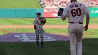 My brother threw the first pitch