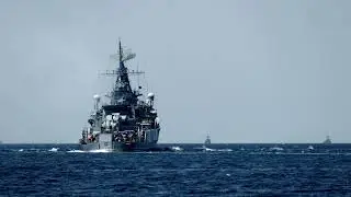 Navy Stock Footage 2021 - Wide Shot Of Us Battleships At Sea With Soldiers On The Stern-45